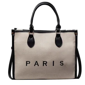 Bolso tote de lona minimalista con ribete de cuero negro e impresión de París
