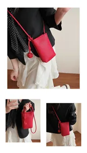 Detailed views of red lychee pattern mini crossbody bag with chic knot tassel accessory