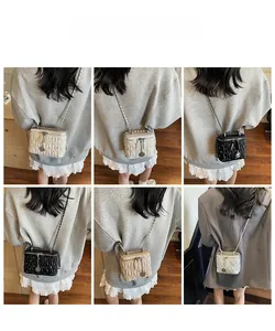 Quilted crossbody chain bag with elegant embroidery details shown in various colors