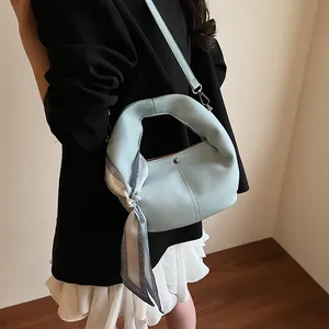 Light blue lychee pattern dumpling bag with silk scarf and silver metal buckle
