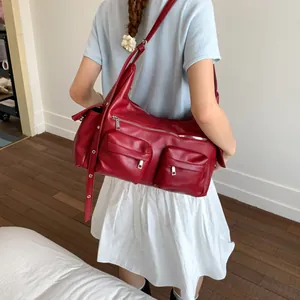 Fashionable dark red multi-pocket shoulder bag with adjustable strap for daily commute