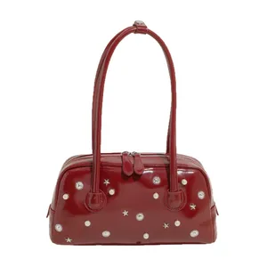 Retro burgundy patent leather shoulder bag with star metal rivets and pearl accents