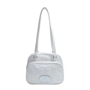 Sac à bandoulière blanc à texture gaufrée avec poche zippée et larges lanières