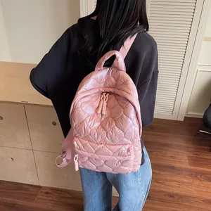 Pink heart quilted backpack with water resistant nylon fabric and large capacity