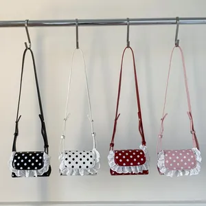 Mini lace polka dot crossbody bags in four colors with adjustable shoulder straps