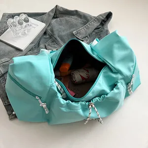 Borsa a spalla verde menta minimalista grande capacità con tasche e dettagli a coulisse