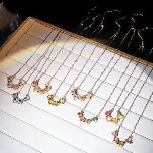 Veelzijdige klavertje vier hart ketting in goud en zilver met kleurrijke zirkonia