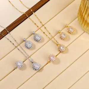 Titanium steel jewelry set with rotating zircon flower pendant necklace and earrings