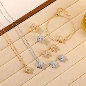 Rotating four-leaf flower jewelry set with zircon necklace earrings and ring