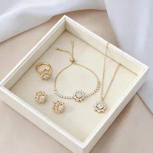 Exquisito conjunto joyas flores doradas con collar de circón, pendientes, anillo y pulsera