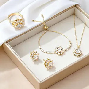 Elegante conjunto de joyas de 4 piezas bañado en oro con circonitas de flores