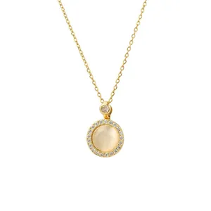 Elegant gold titanium necklace featuring a rotating cat's eye stone pendant with zircon halo