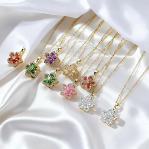 Rotating flower necklace with zircon petals in vibrant colors on a gold chain