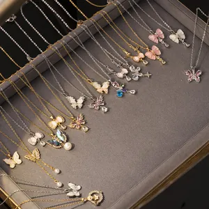 Elegant butterfly tassel necklaces in gold and silver finish with zircon and pearls