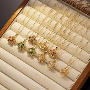 Rotating zircon flower necklace set in gold plating with colorful gemstone accents