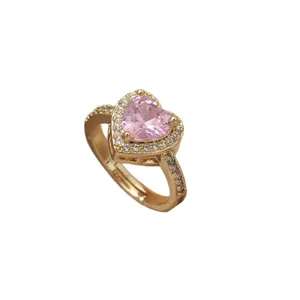 Bague coeur ajustable dorée avec zircon rose et détails en pavé de diamants