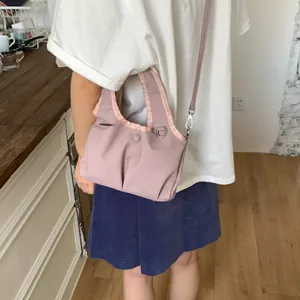 Large mauve nylon tote bag with pleated design for women, stylish crossbody commute style