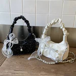 Chic pleated crescent handbags in black and white lace with bows and pearl chains