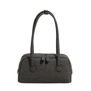 Retro denim Boston bag in dark grey with dual handles and spacious minimalist design