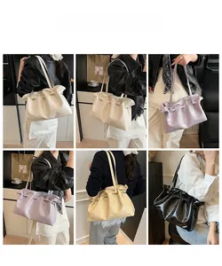 Collage of four stylish ruffled tote bags in cream, lilac, yellow, and black colors