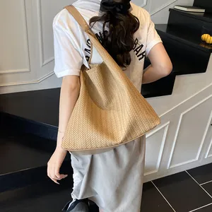 Summer commuter tote bag with herringbone weave and leather straps in khaki brown