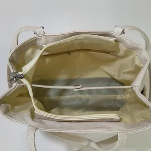 Grand sac cabas en toile beige avec trois compartiments internes et fermetures