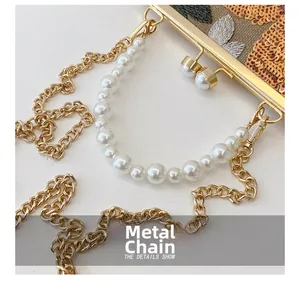 Detailed close-up of hardware chain and pearl handle on sequin shell bag