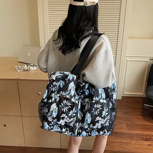 Bolso de viaje grande de tela Oxford con estampado floral y bolsillos de malla