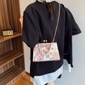 Elegant floral sequin shell bag with pearl handle and metal chain for women