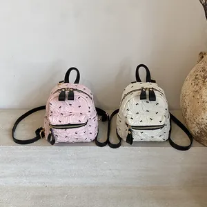 Mini-Rucksack mit Falten-Optik, Schleifendruck und Goldreißverschlüssen in Rosa und Weiß