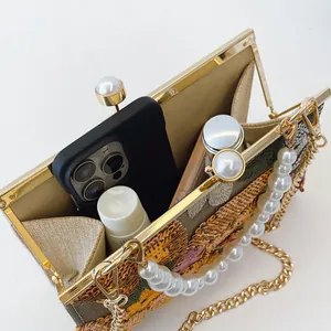Fashionable sequin sunflower shell bag with pearl clasp and spacious interior