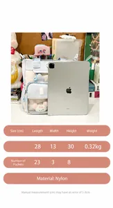 Detailed size comparison of the bicolor ita bag with dimensions shown next to an iPad
