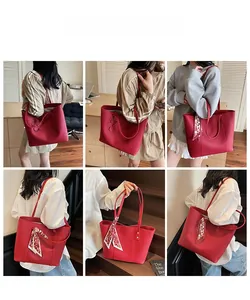 Red tote bag with floral details and silk scarf handle shown in lifestyle settings
