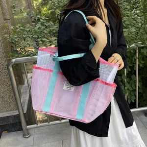 Pink and blue mesh tote bag with patchwork design and durable shoulder straps for summer