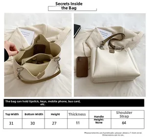 Detailed size chart for the minimalist PU leather tote bag with interior compartments
