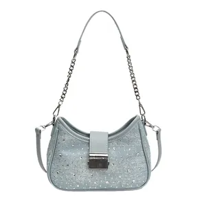 Light blue denim hobo bag with sparkling rhinestones and silver chain strap for women