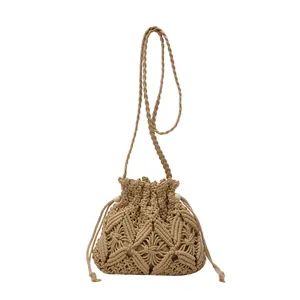 Retro hollow crochet bucket bag with handmade woven texture and drawstring for beach travel