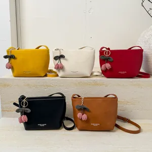 Minimalist square crossbody bags in five colors with cherry pendants for women