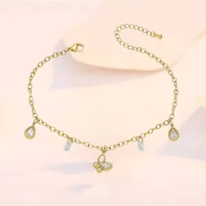 Gold butterfly anklet for women with drop-shaped zircon charms and adjustable O-chain link
