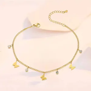 Detail of gold butterfly anklet with sparkling zircon charms and adjustable clasp