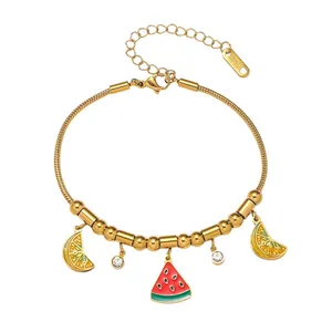 Bracelet chaîne serpent dorée en acier inoxydable avec charmes fruits en zircone