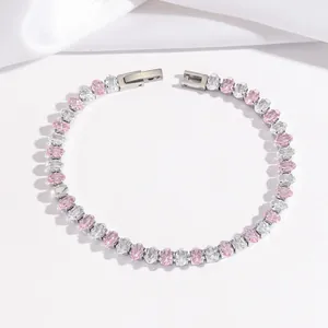 Silver-plated tennis bracelet featuring pink and clear oval crystals in a row