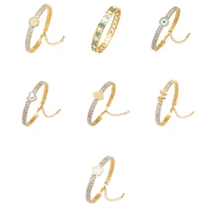 Gold-plated stainless steel bracelet collection with zircon stones and various charms