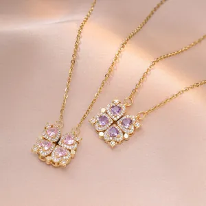 Vue détaillée du collier trèfle en forme de cœur avec cristaux roses et violets