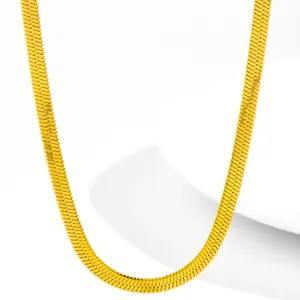 Detailed macro view of 18K gold-plated flat herringbone snake chain necklace texture