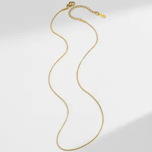 Detailed view of gold stainless steel snake chain with adjustable lobster clasp