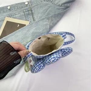 Blue plaid canvas crossbody bag with cute rabbit ears and decorative pearl pendant