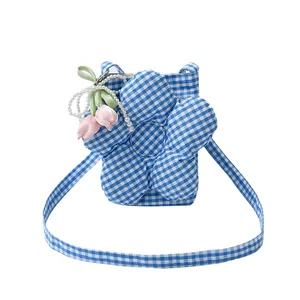 Blue and white plaid canvas crossbody bag with large 3D flower and tulip pearl charm