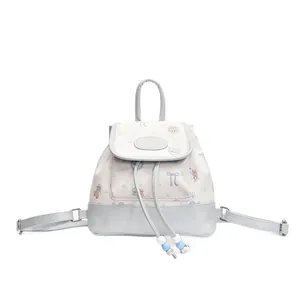 Mini floral bear backpack in cream and light blue with drawstring bucket closure