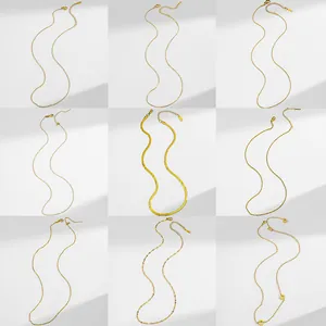 Nine assorted 18K gold plated stainless steel necklaces with various chain link styles